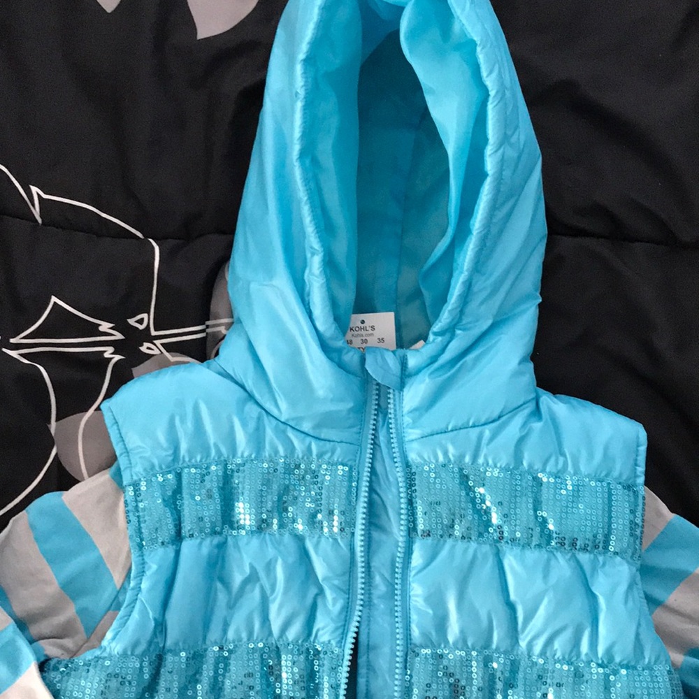 2 piece long sleeve shirt with puffy vest.